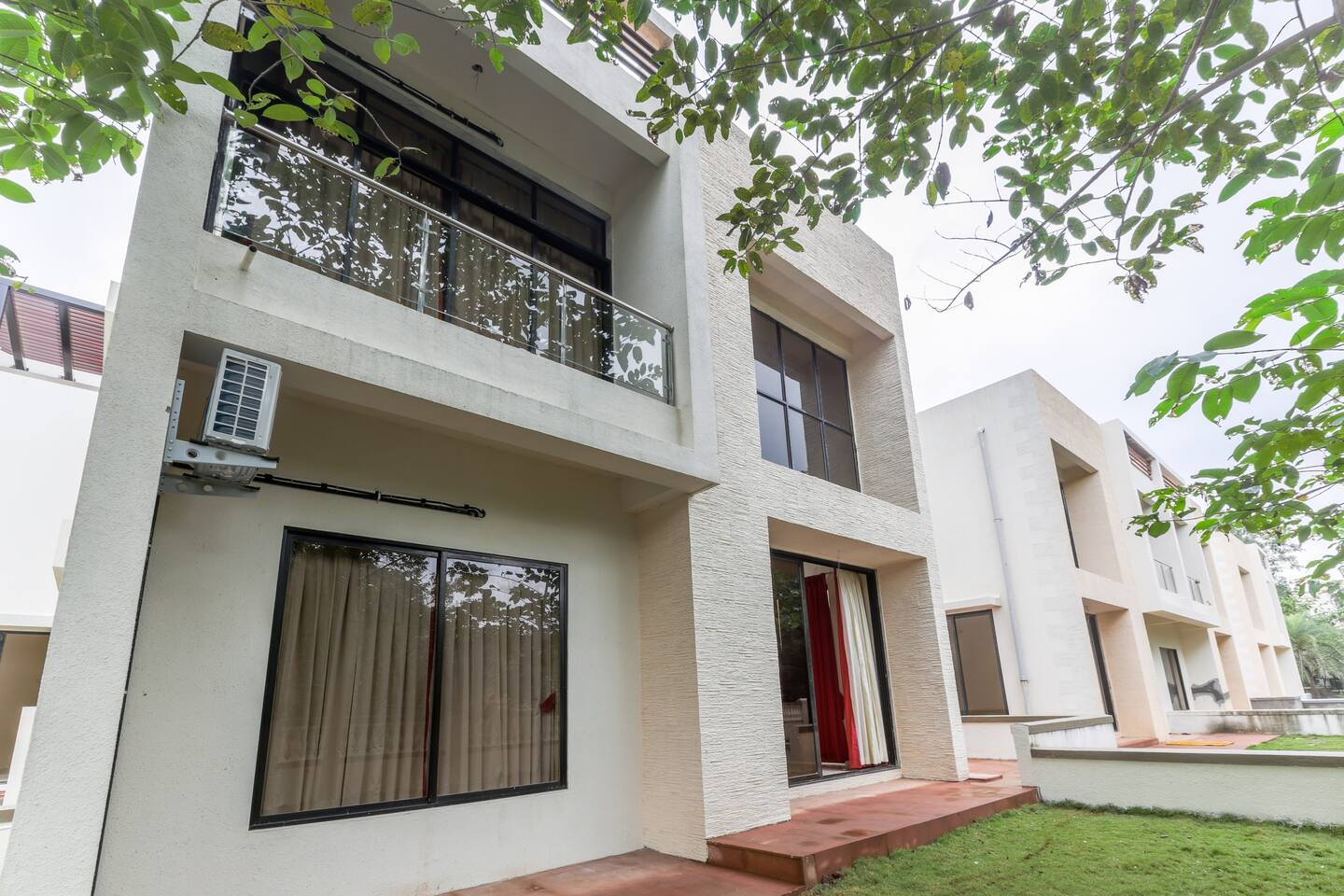 StayVista | Greenwoods Seven Villa w/ Pool & Lawn - Tap to explore photos