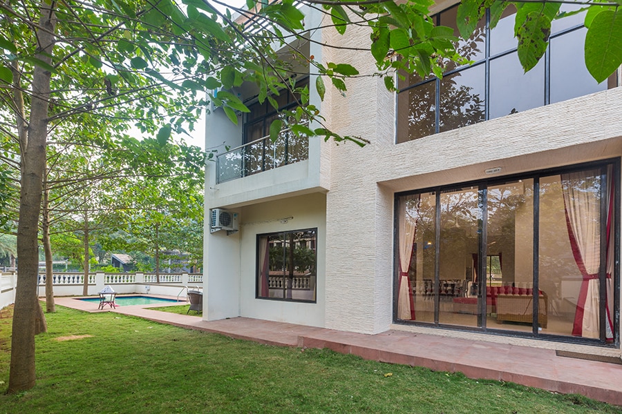 StayVista at Greenwoods 9 Villa with Private Pool & Ping-Pong Table - Tap to explore photos
