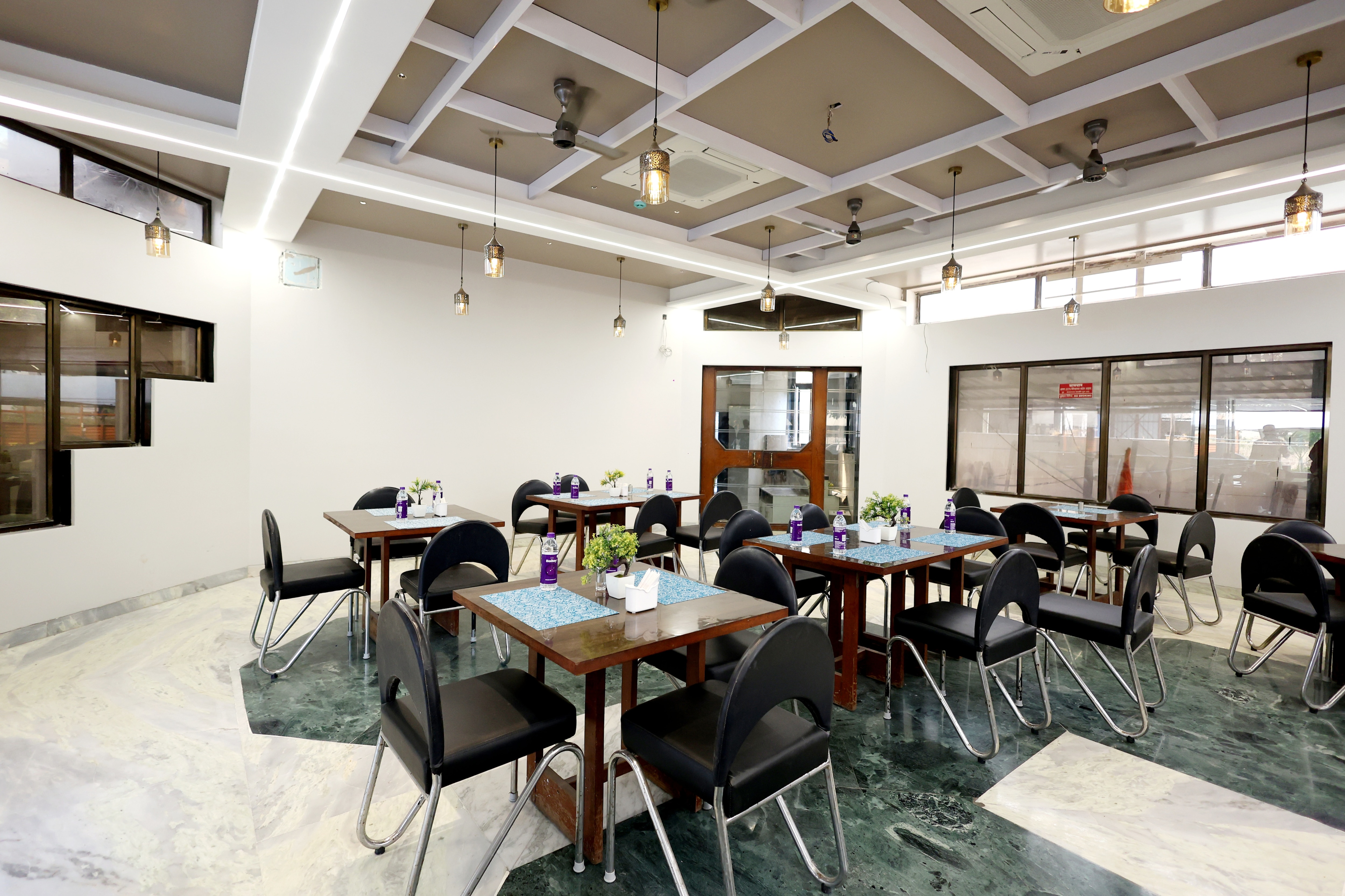 Hotel StatusInn (Pure Veg) Restaurant