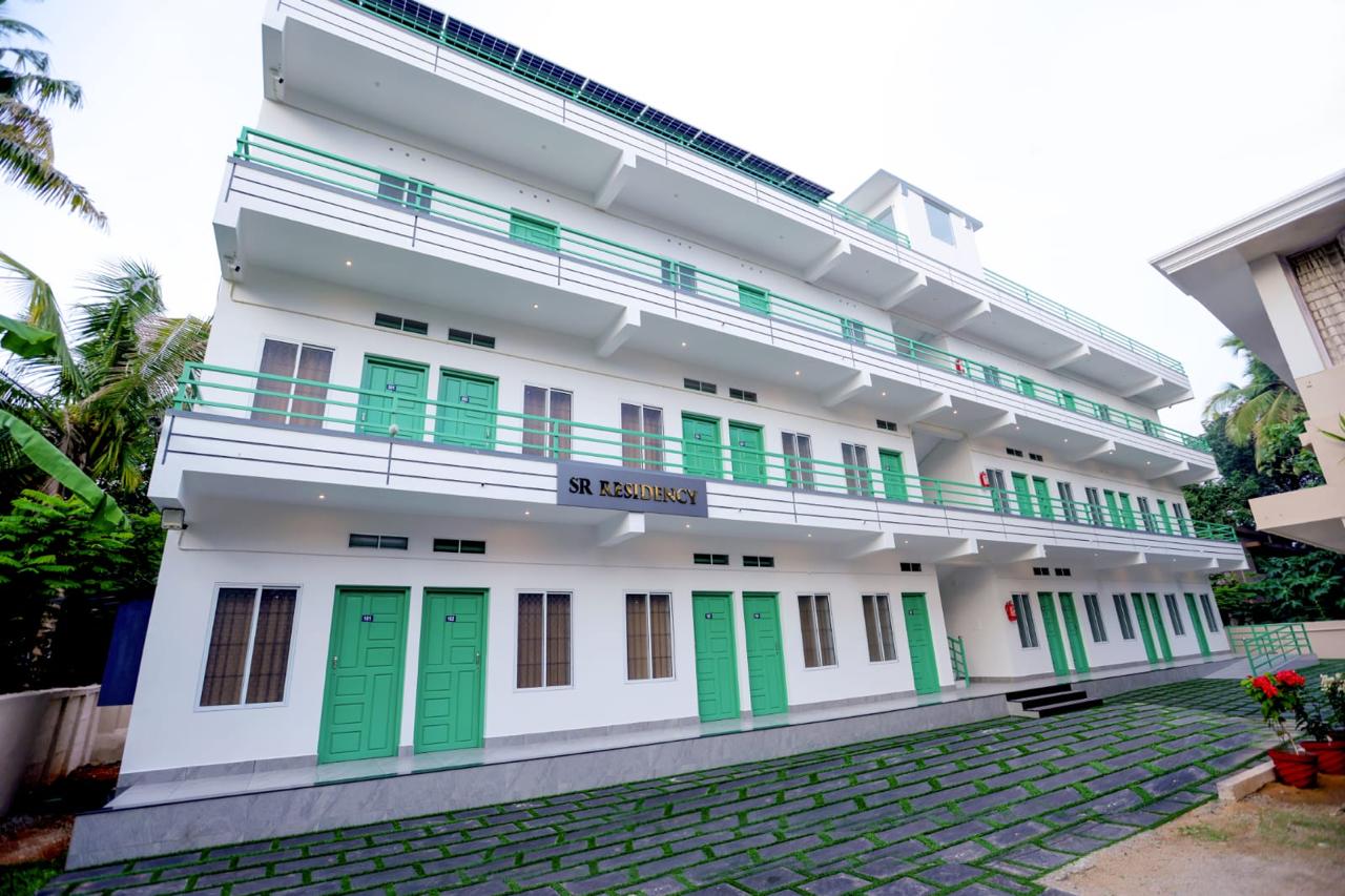 Rooms of SR Residency Kollam - Lodge in Kollam