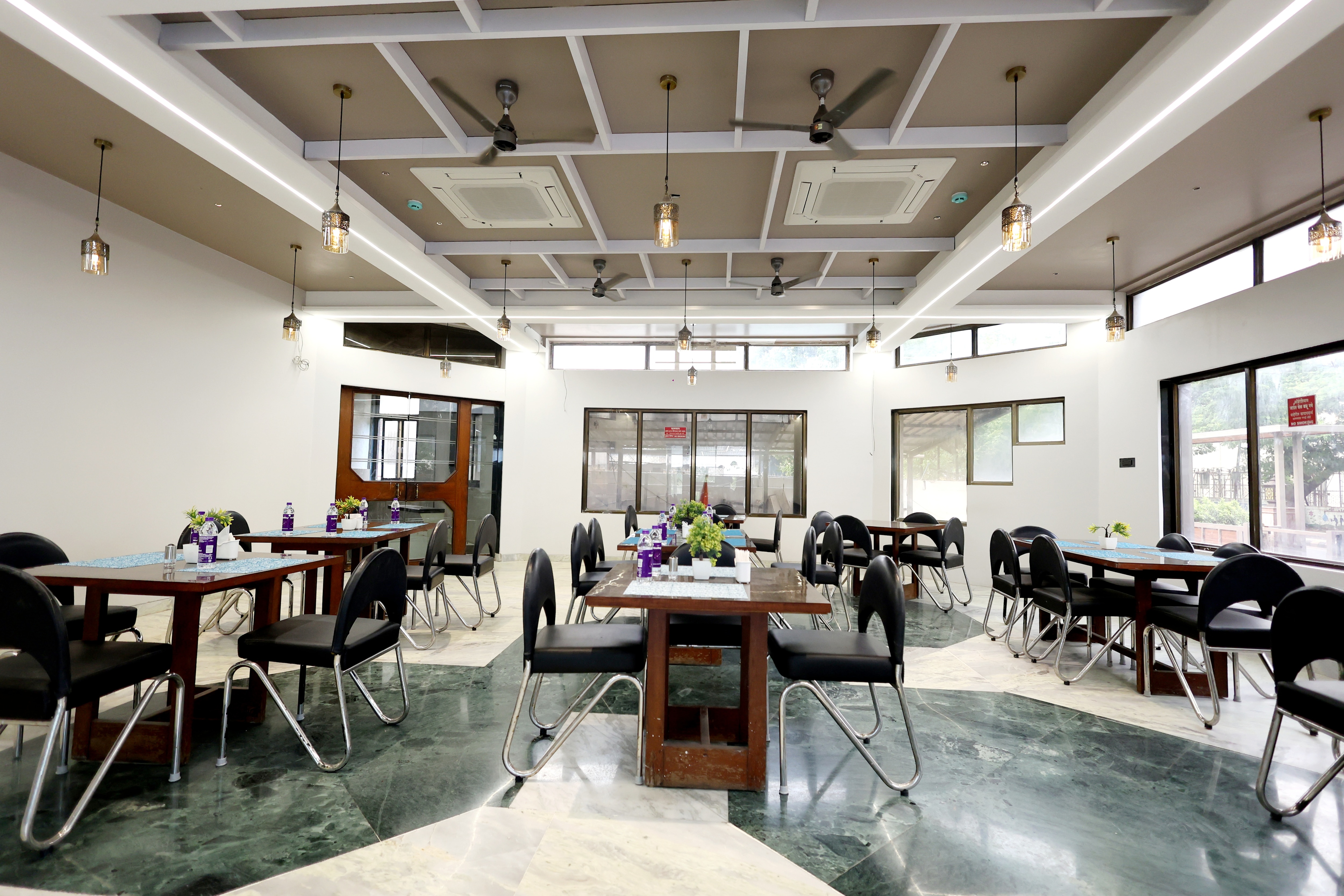 Hotel StatusInn (Pure Veg) Restaurant
