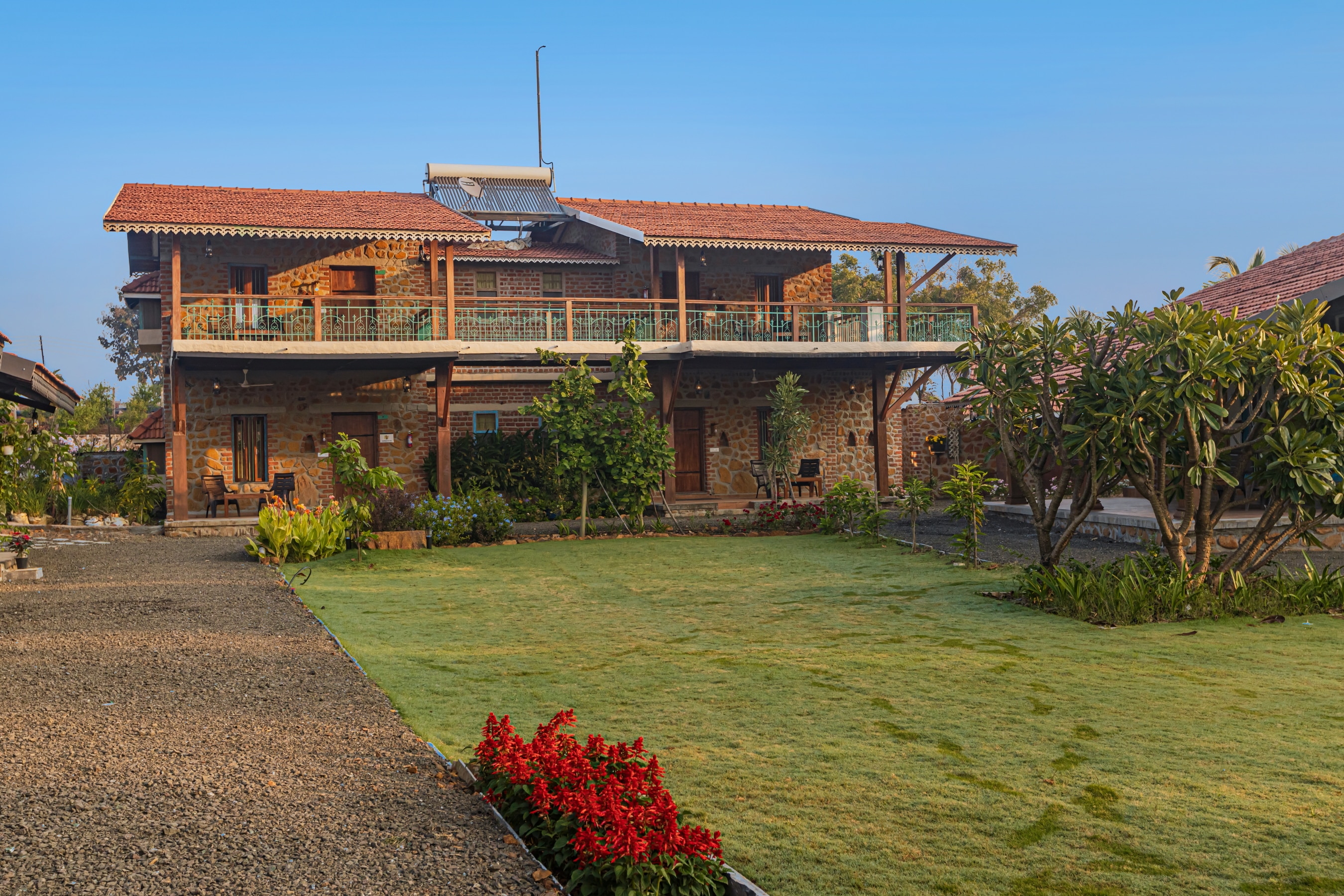 SaffronStays Lake House Bouganvillea - Tap to explore photos